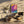 Wistful Light minimalist Danish art poster with soft red, purple and yellow gradients on enhanced matte paper. Interior setting.
