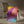 Wistful Light minimalist Danish art poster with soft red, purple and yellow gradients on enhanced matte paper. Interior setting.
